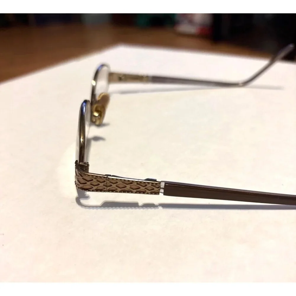 Vtg Marchon Oval Gold-Tone Eyeglasses With Intricate Side Details Frames only
